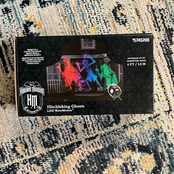Color changing Haunted Mansion hitchhiking ghost LED WaveMotion projector - Picture 3 of 6